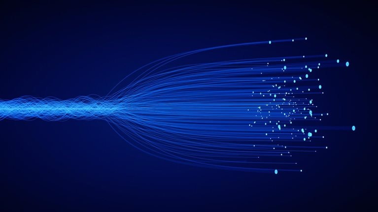 Filaments of light that go from a compact collection to a dispersed array.
