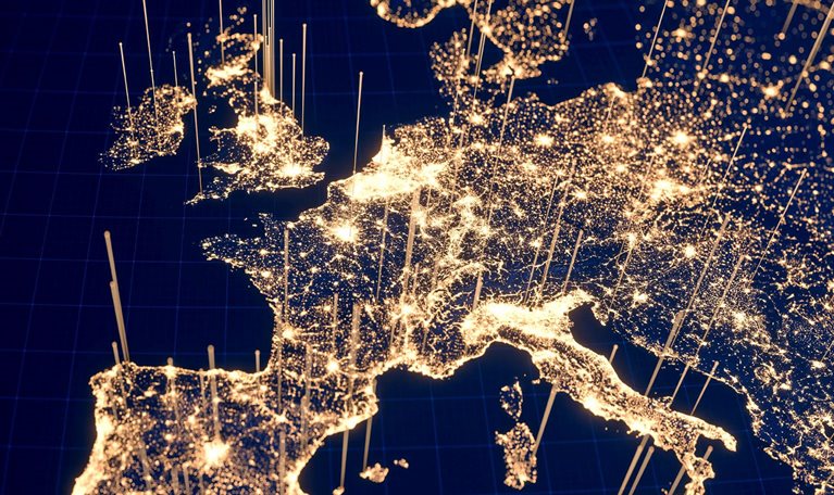 From a space perspective, Europe can be seen at night with clusters of golden dots representing city lights. Additionally, golden lines emanate from these urban regions, indicating the presence of technology and communication.