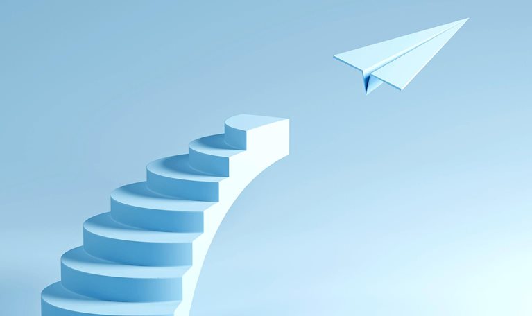 A minimalist staircase rising into the sky with a paper plane taking flight