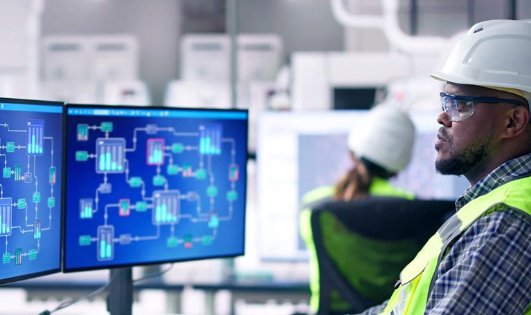 An engineer operators using scada system at industrial plant