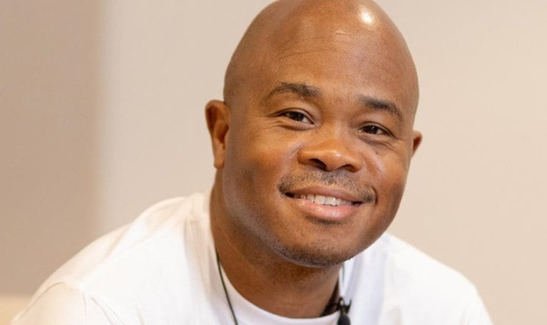 Smiling portrait of Fred Swaniker