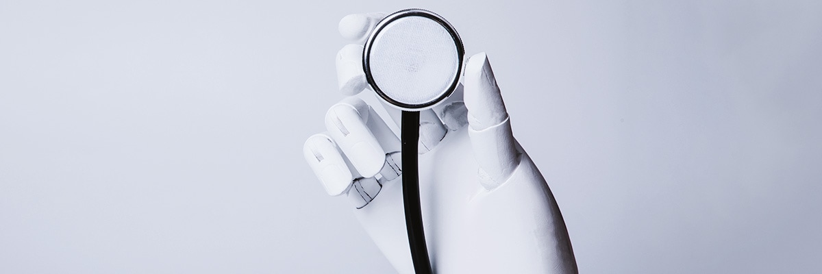 Robotic hand holding a stethoscope