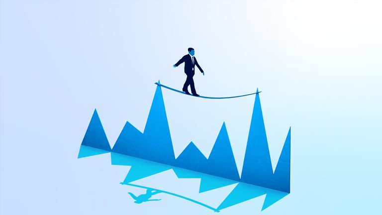 Illustration of a businessman balancing on a tightrope tied between two peaks of a graph