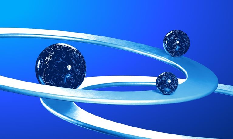 marbles spiraling down circles