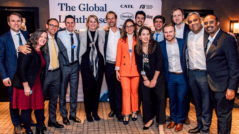 Enno (center) at the World Economic Forum celebrating the Global Lighthouse Network.