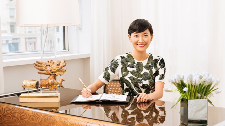Shirley Chen, founder of Narrativ, sitting at a desk