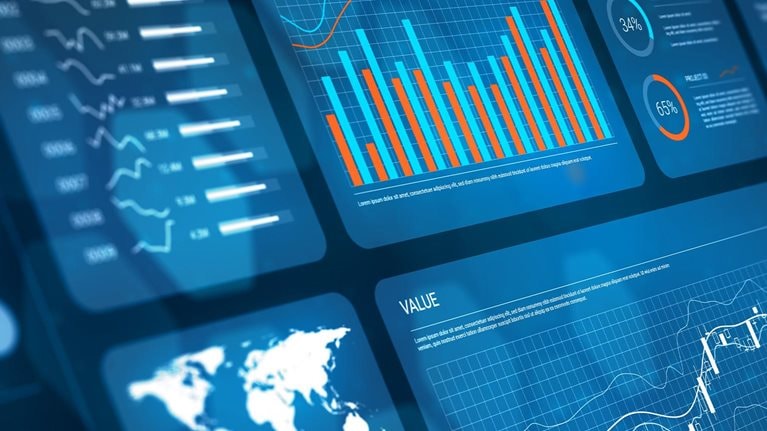 Analyst working with Financial Data and Business Analytics Dashboard on computer to make Financial Report with KPI and Metrics.