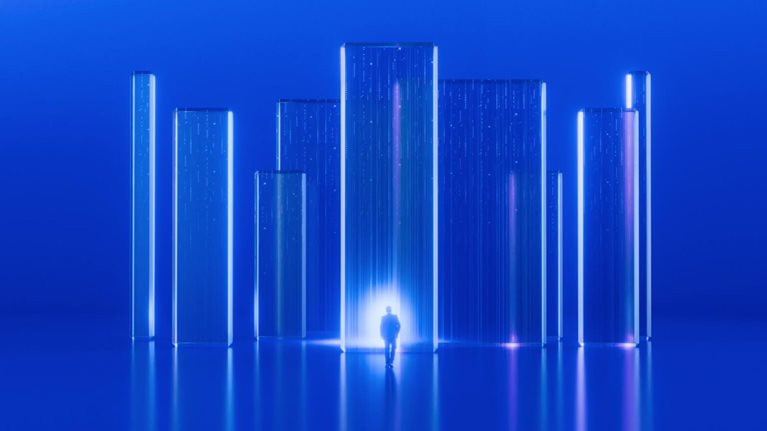 The image depicts a minimalist, futuristic digital artwork rendered in vibrant blue tones. A small silhouette of a person walking toward a bright, glowing light source. Several tall, transparent glass or crystal rectangular pillars resembling a abstract city skyline. Glowing vertical streaks and neon highlights in shades of blue and soft pink light up the structures. A perfectly smooth, glossy floor that mirrors the pillars and light, creating a symmetrical look.