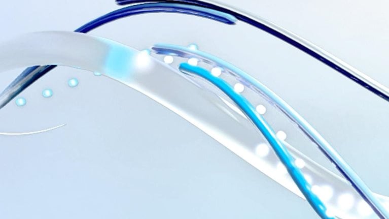 Curling lines with spheres wrapped around each other in a helix shape.