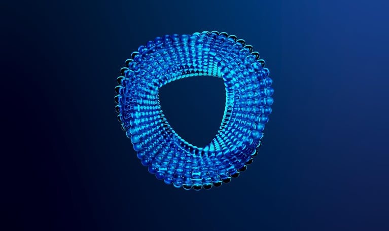 A cascade of transparent marbles, each varying in size, weave together to form an endless Möbius strip