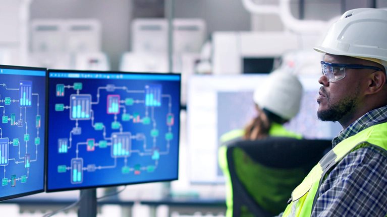 An engineer operators using scada system at industrial plant