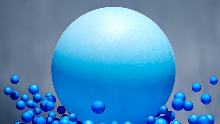 A 3D illustration of a large blue ball splashing into many, much smaller, blue balls