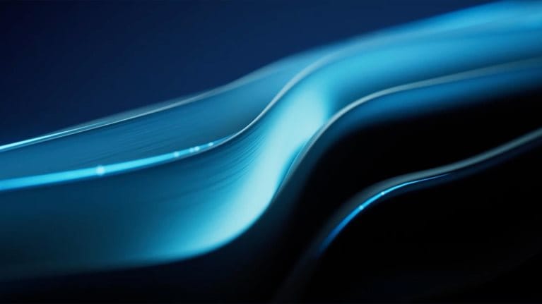 Smooth, flowing blue curves with light reflections against a dark background, creating a serene and futuristic abstract visual.