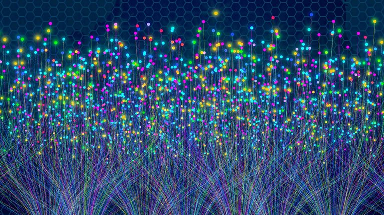 Numerous strands of light radiate from various areas at the bottom of the picture and scatter into luminous dots in the middle. The backdrop is a deep blue color with a see-through map of the world.