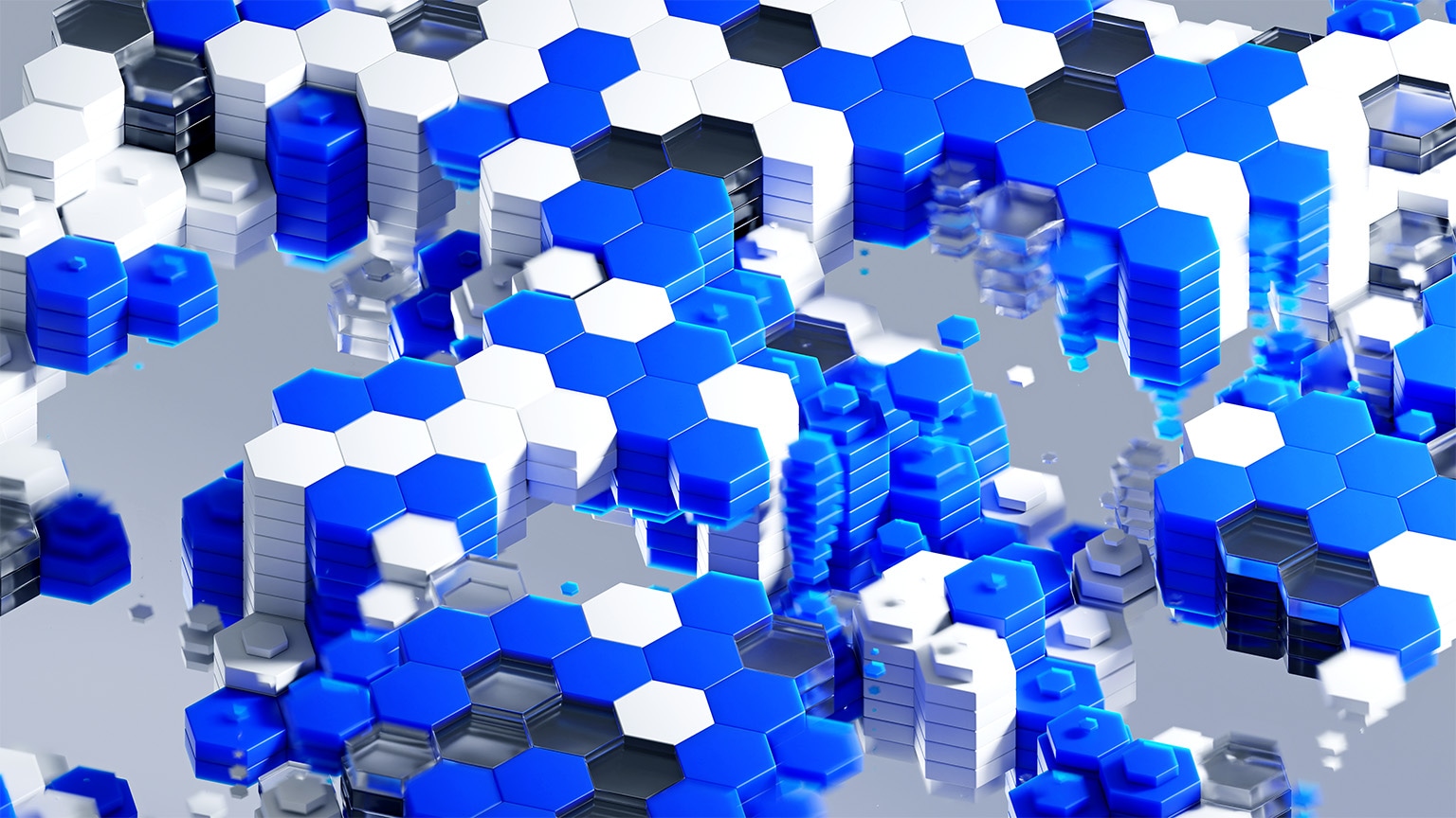 Digitally generated image of a hexagonal grid, with individual tiles fitting together like a puzzle, forming a 3D structure