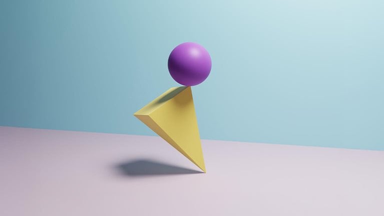 Sphere balanced on a pyramid in an impossible position