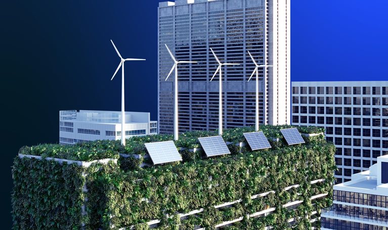 Image of high-rises in a cityscape focused on a sustainable building with solar panels, wind turbines, and a green roof.