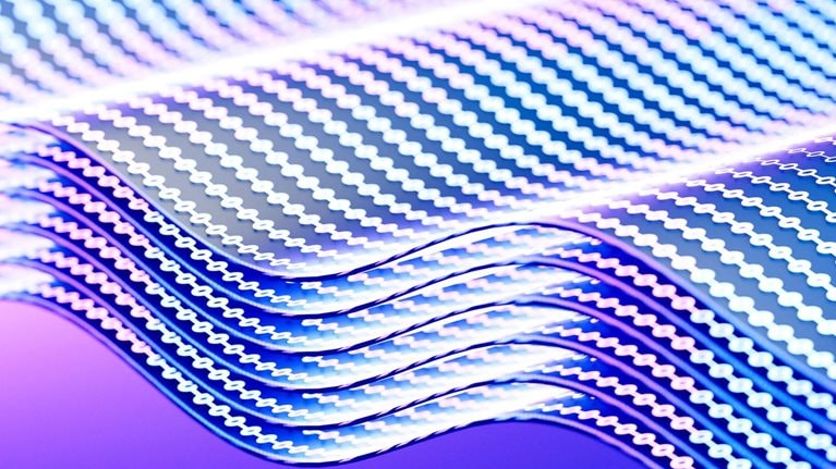 Abstract image of flowing, wave-like grid made of glowing dots in blue and purple tones.