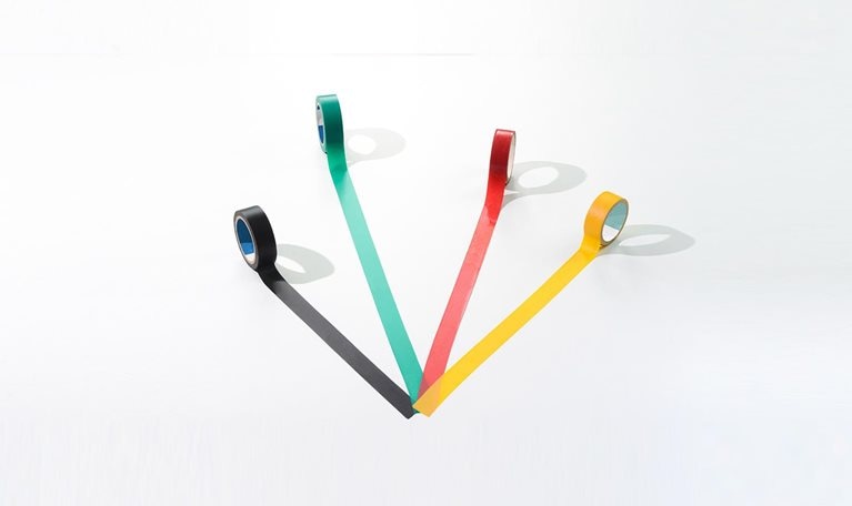 Concept of leadership. Adhesive tapes moving in different directions. - stock photo