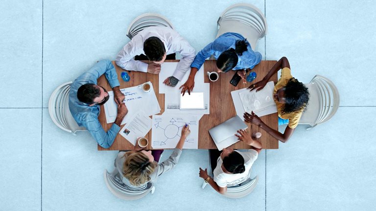 Top view of creative businesspeople having meeting 