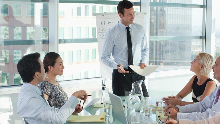 Image of team meeting