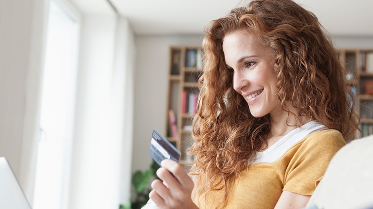 Image of woman making an online purchase