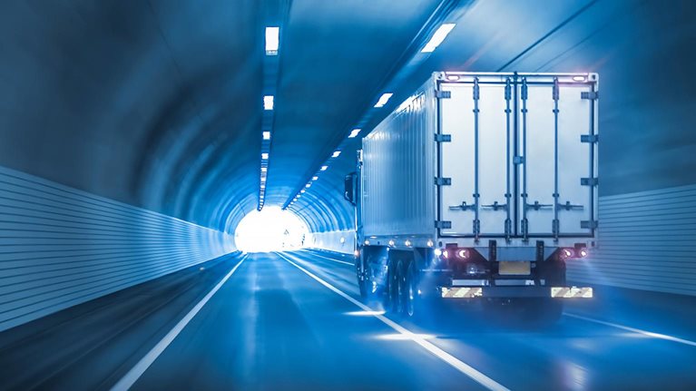 Trucks passing through tunnels