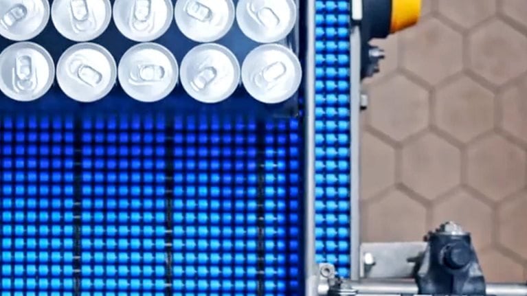 overhead view of beverage packaged goods assembly line