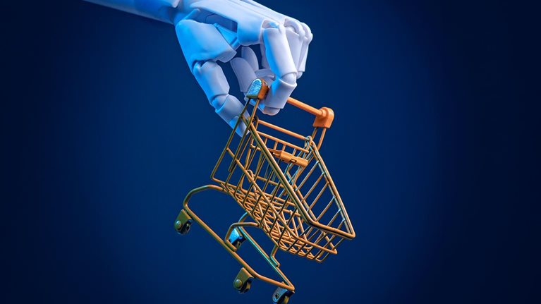 Robotic hand holding a miniature shopping cart: concept of e-commerce, automation and AI retail