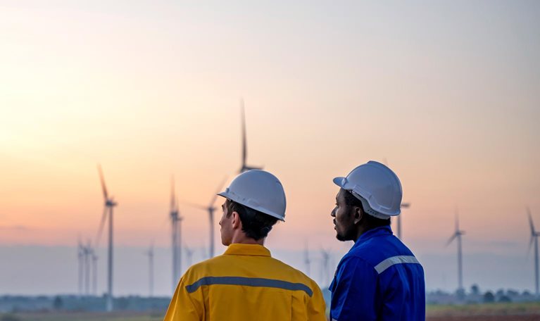 Windmills and Workers - stock photo