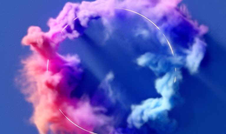 Colorful smoke flowing around a glowing ring