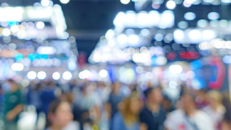 Blur, defocused background of public exhibition hall. Business tradeshow, job fair,