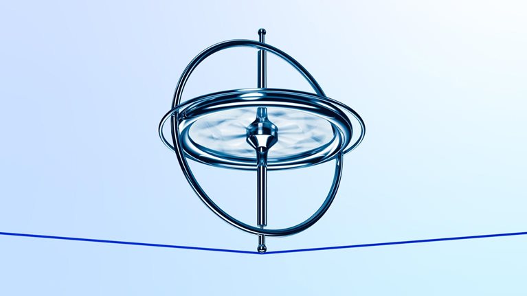 A metallic gyroscope spins on a thin red tread which bends slightly from the weight. The scene is set against a soft blue and white gradient background.