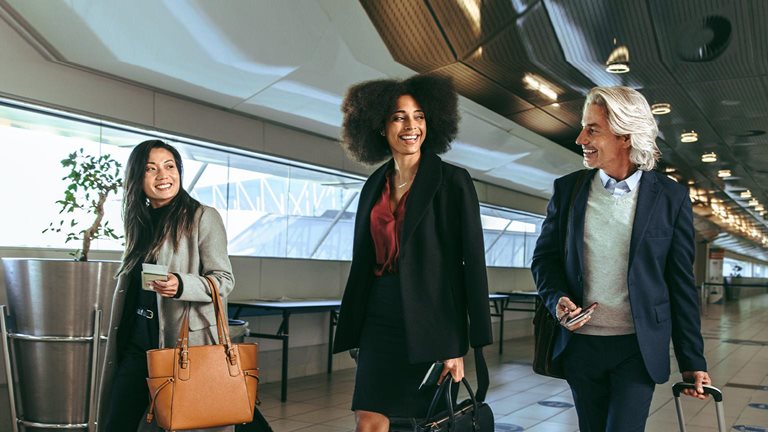 Multi ethnic people going on business trip - stock photo