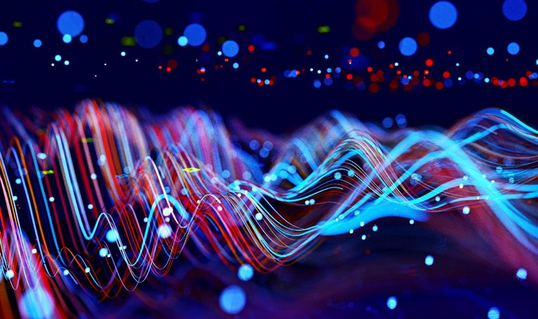 Digital generated image of abstract flowing data made out of numbers and glowing blue and red splines moving away from camera on black background.