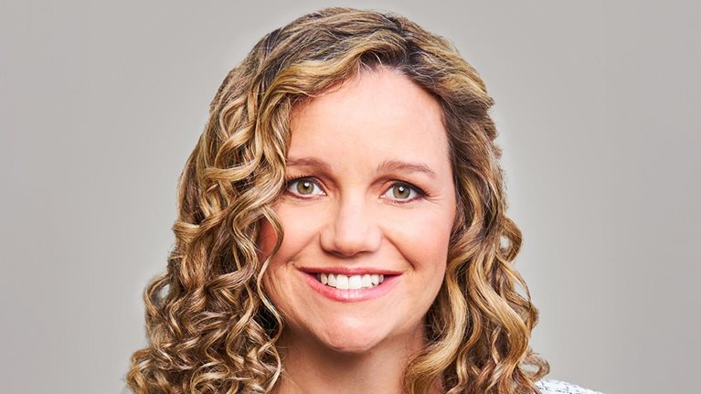 Smiling portrait photo of Laura Hines-Pierce, co-CEO of Hines