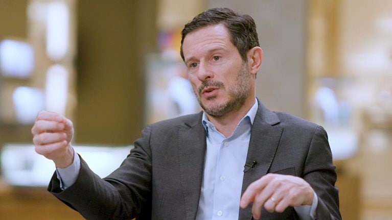 An image of Olivier Bron answering a question during an interview.