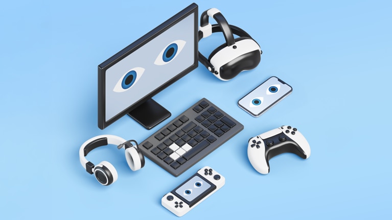 This image is a 3D isometric illustration of a modern gaming setup. It includes the following items: A desktop monitor showing an eye icon. A gaming headset and VR headset. A wireless gamepad and keyboard. A handheld gaming console.