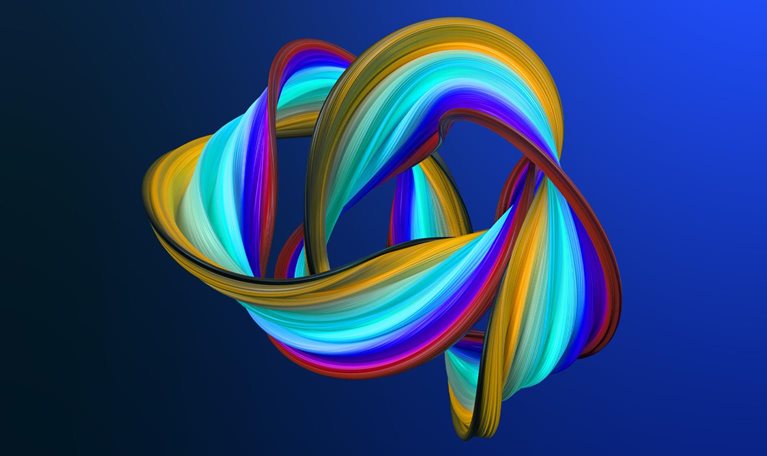 An abstract ribbon that twists and overlaps, resembling a multicolored mobius strip. The ribbon is striped with colors including yellow, orange, teal, blue, and purple, and it is set against a dark blue background.