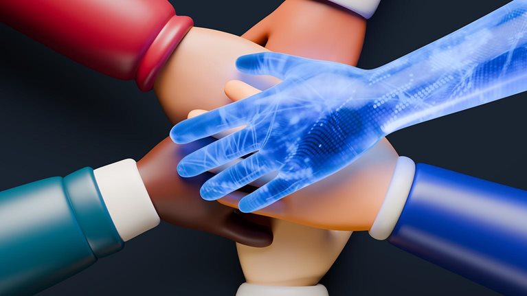 Multiple hands stacked on top of each other